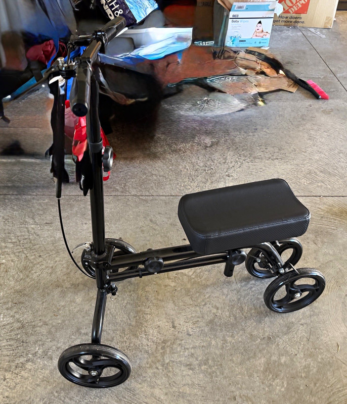 Black 4-Wheeled Mobility Scooter, 4-Wheel, with Seat and Front Basket