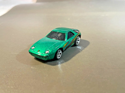 Vintage 1978 Hot Wheels Porsche 928, Green w/ splash of color (C88)