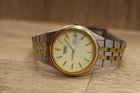 Seiko Men's Watch 7N43-9041 luminous champagne dial two tone NEW BATTERY 7.25"