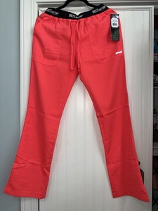 New With Tags. Grey’s Anatomy 3 Pocket Scrub Pants. Size Small. Papaya.