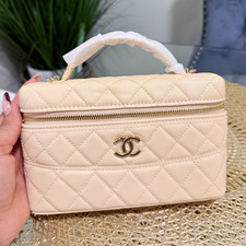 CHANEL Beige Quilted Vanity Case Top Handle Z...