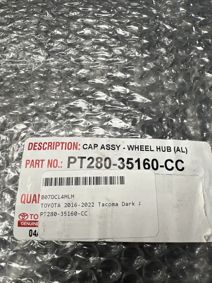 Tapa central 16-22 Toyota Tacoma OEM 42603 YY290 (NUEVO) carbón PT280-35160 -CC Foto 3 de 3