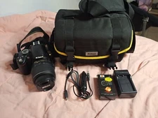Nikon D3000 DSLR Camera with 18-55mm Lens, Charger, Extra Battery, Bag