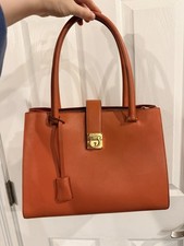Salvatore Ferragamo Gancini flip-lock leather tote bag in coral