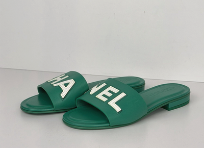 Chanel Mules in Emerald Green Leather with Logo Lettering 36 EU