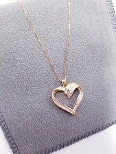 1/3 CT. T.W. Diamond 10K Yellow Gold Heart Pendant Necklace