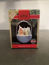 VTG Hallmark Light and Motion Bringing Home The Tree 1991 Plug In Tree Ornament
