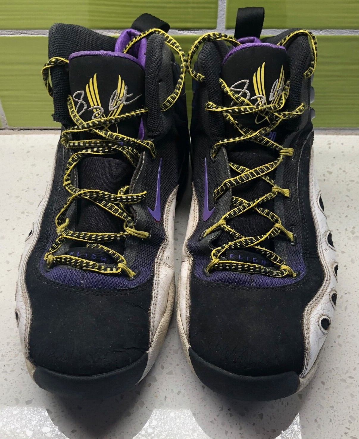 nike sonic flight purple venom