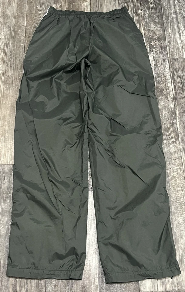 Pantalones de chándal vintage Nike para mujer grandes con cremallera al tobillo lateral a rayas bordado Swoosh Foto 3 de 4