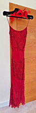 Stunning red sequin dress and fascinator
