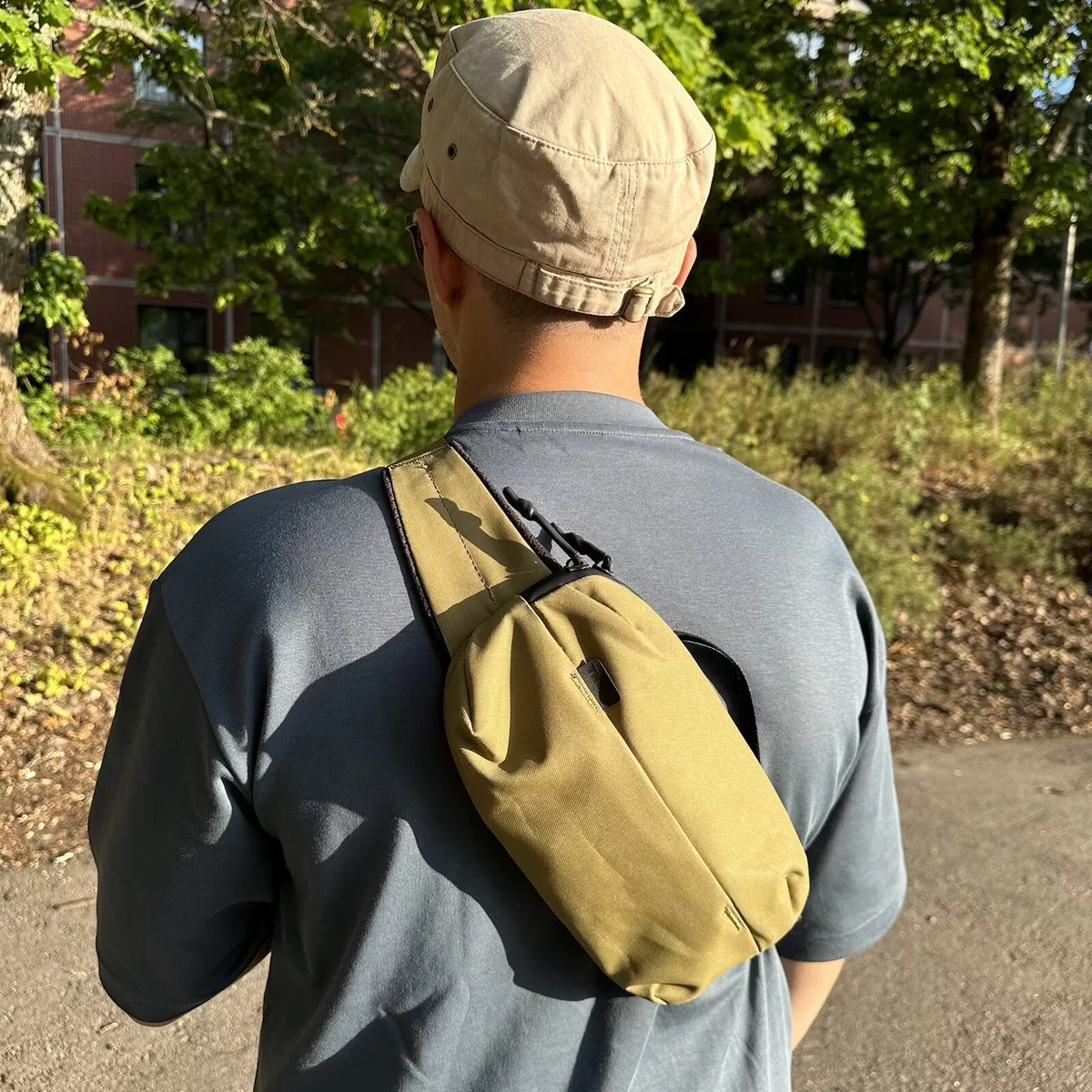 Thule sling sales backpack