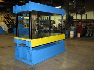 42 ton hydraulic press frame with 80" x 42 bed area.