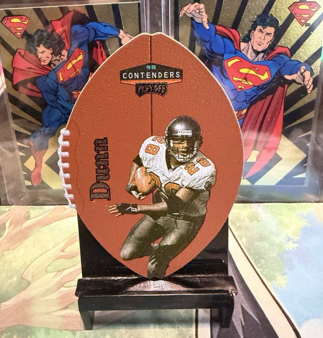 Warrick Dunn #92 Football Cards 1998 Playoff Contenders Leather trading card — raw and PSA graded price guide
