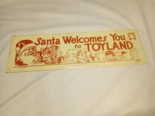 Vintage Santa Welcomes You to Toyland, 18" x 5.5" Tin Metal Sign Made in USA