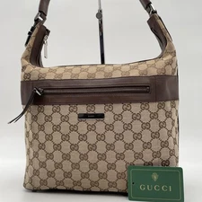 Luxury Good Gucci GG Canvas Logo Plate Shoulder Bag Brown