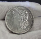 1890 O US Morgan Silver Dollar $1 AU (Cleaned)