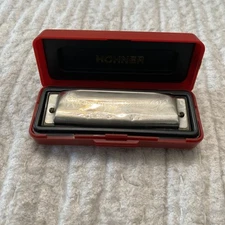 Harmonica Hohner Special 20 with red aluminum comb, various keys