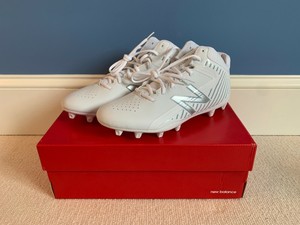 new balance rush cleats