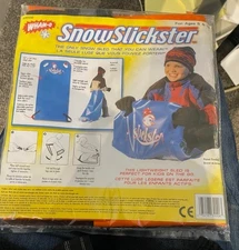 New Wham-O SnowSlickster Wearable Snow Sled 42 x 20 PVC Vinyl for kids Orange