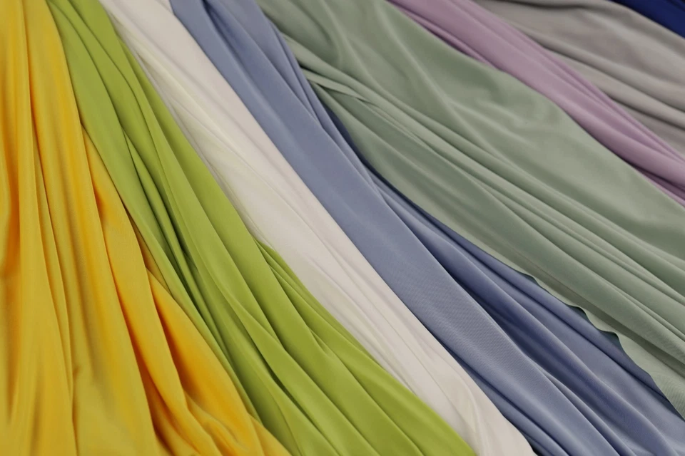 Tela tejida jersey elástica venechia 47 colores por yarda 60" de ancho Foto 3 de 4