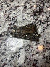 This vintage 1983 train belt buckle was manufactured by The Great American