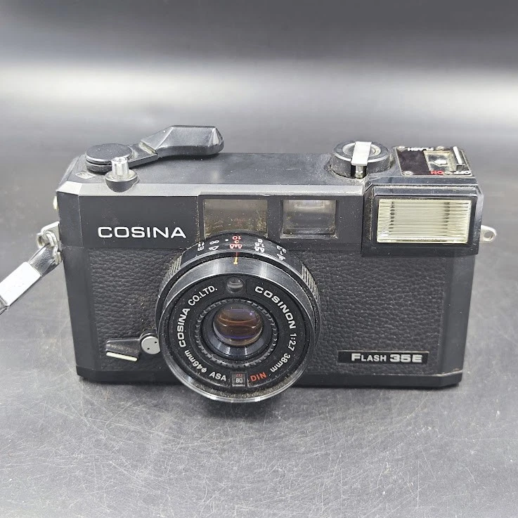 Appareil Photo Vintage Cosina CX 70 35mm – Compact Argentique (état Fonctionnel)