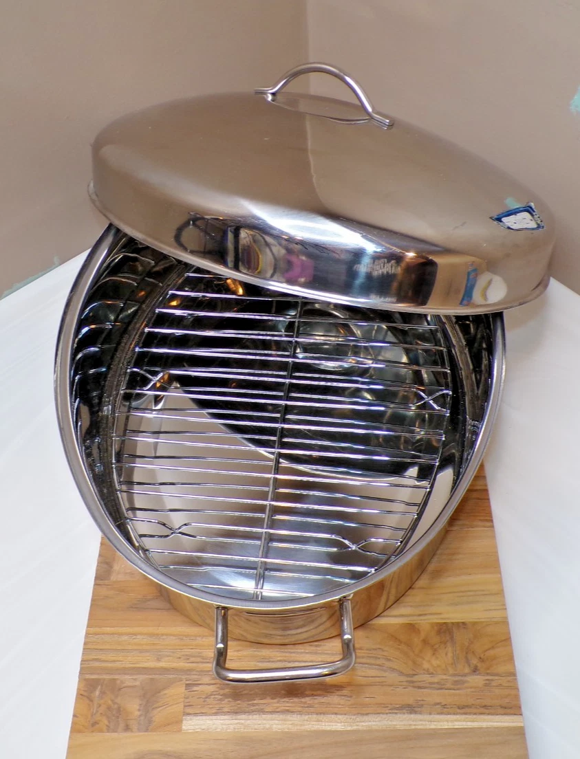 17" Oval Stainless Steel Roasting Pan with a Matching High-Dome Lid and a Rack
Opens in a new window