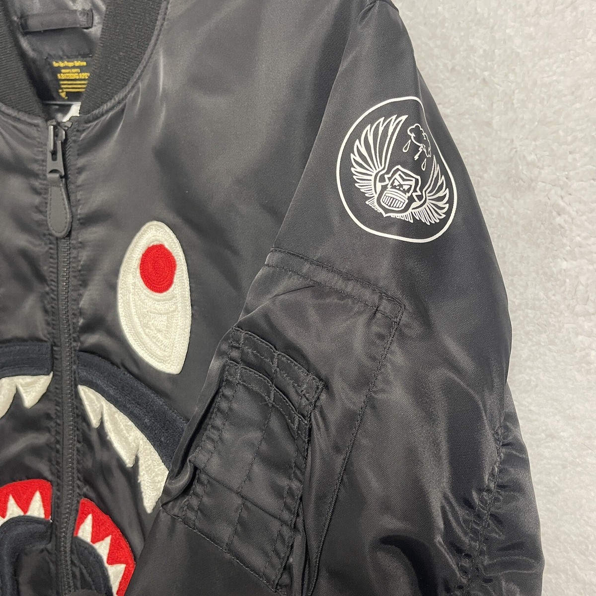 A Bathing Ape BAPE Nylon MA-1 Shark Embroidered Bomber A Bathing Ape BAPE Nylon MA-1 Shark Embroidered Bomber