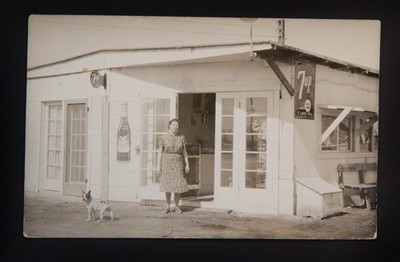 1939 RPPC PHOTO MOM & POP STORE EASTSIDE CHERRY SODA &  7UP SODA ADVERSTING SIGN