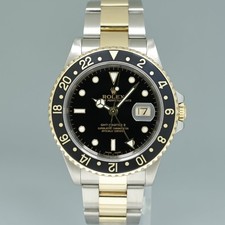 MINT 2000 Rolex GMT-Master 16713 Black Two-Tone Yellow Gold and Steel Oyster 2