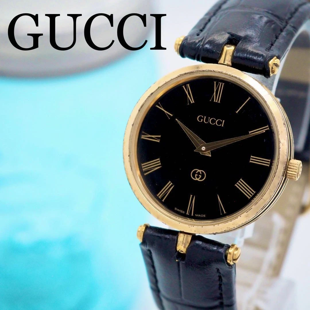 Ceinture montre homme 260 Gucci noir ligne latérale dorée