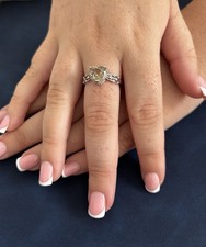 Heart Cut Smokey Quartz Adjustable Crystal Ring set in a silver tone base 