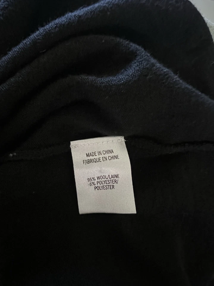 Vestido suéter Theory para mujer talla grande negro de lana cuello alto manga larga Foto 2 de 4