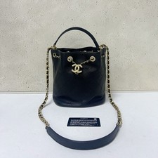 Chanel Quilted Caviar Drawstring Bucket Bag Black Gold‑Tone Hardware Top Handle