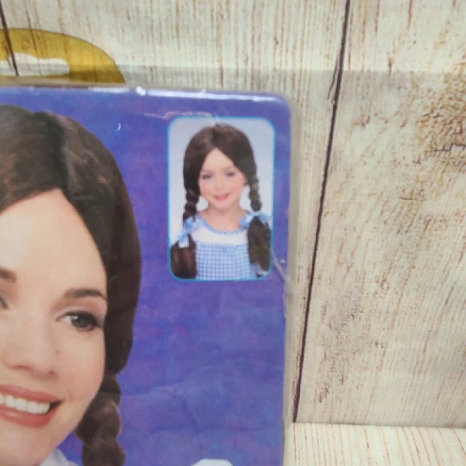 Peluca Dorothy Rubie's Warner Bros El Mago de Oz para niños talla única marrón Halloween Foto 3 de 4