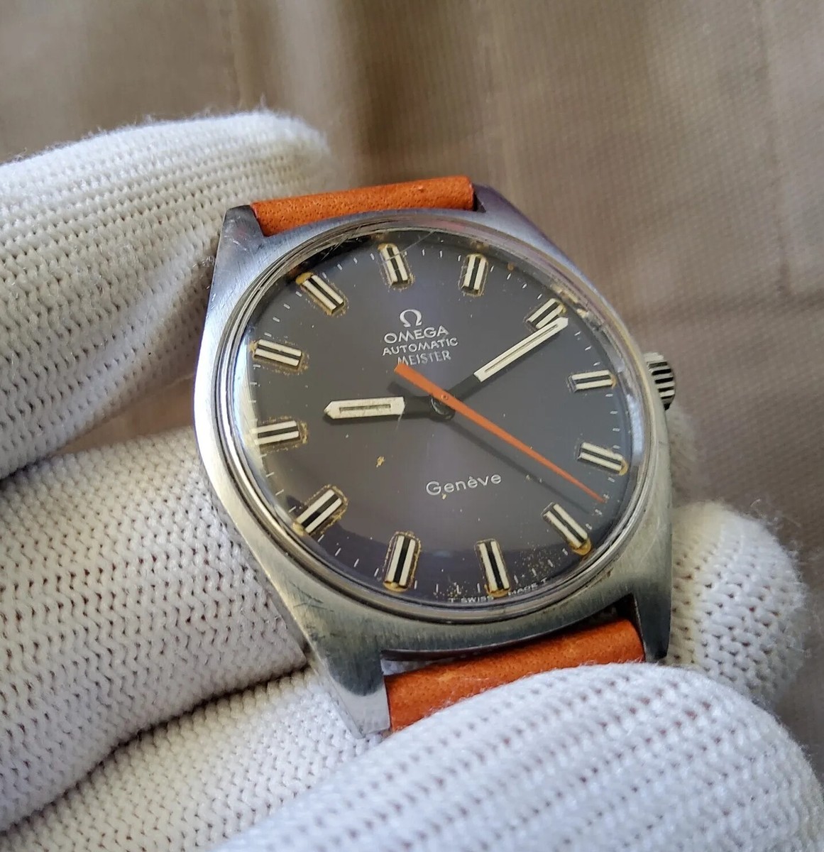 omega orange second hand