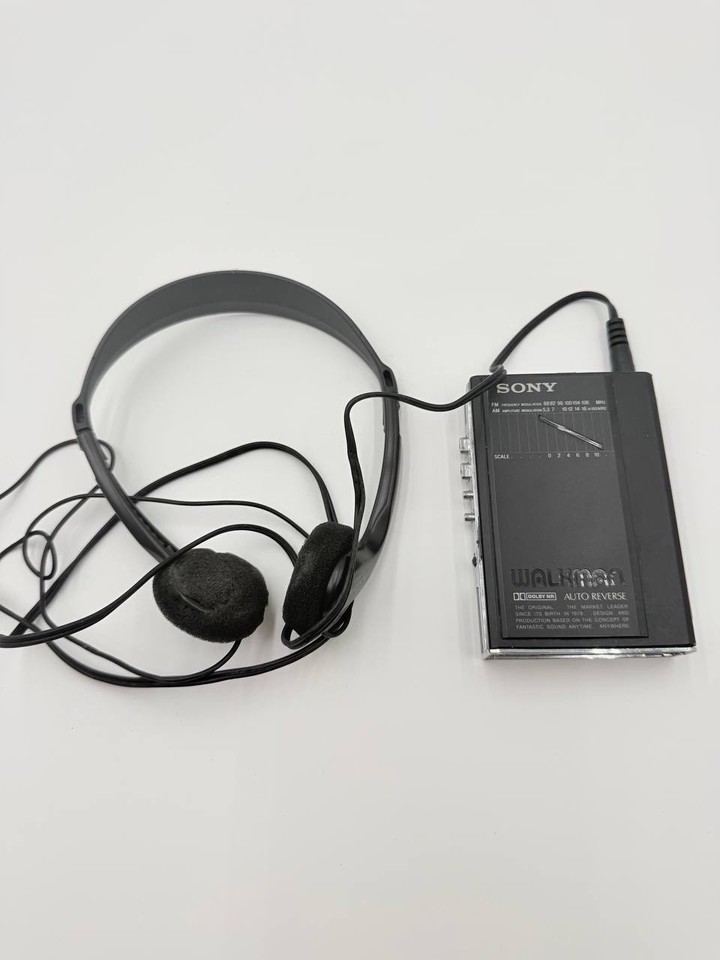 The WM-F100II is a legitimately handsome early-80s Walkman with FM/AM radio, tested and working — a true vintage statement piece.