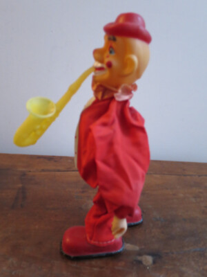 RARE - Ancien automate clown jouant du saxo avec sa boite d