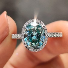 Cyan Blue Stone Oval 2.85 TCW Halo Set Engagement Ring In 14K White Gold Plated