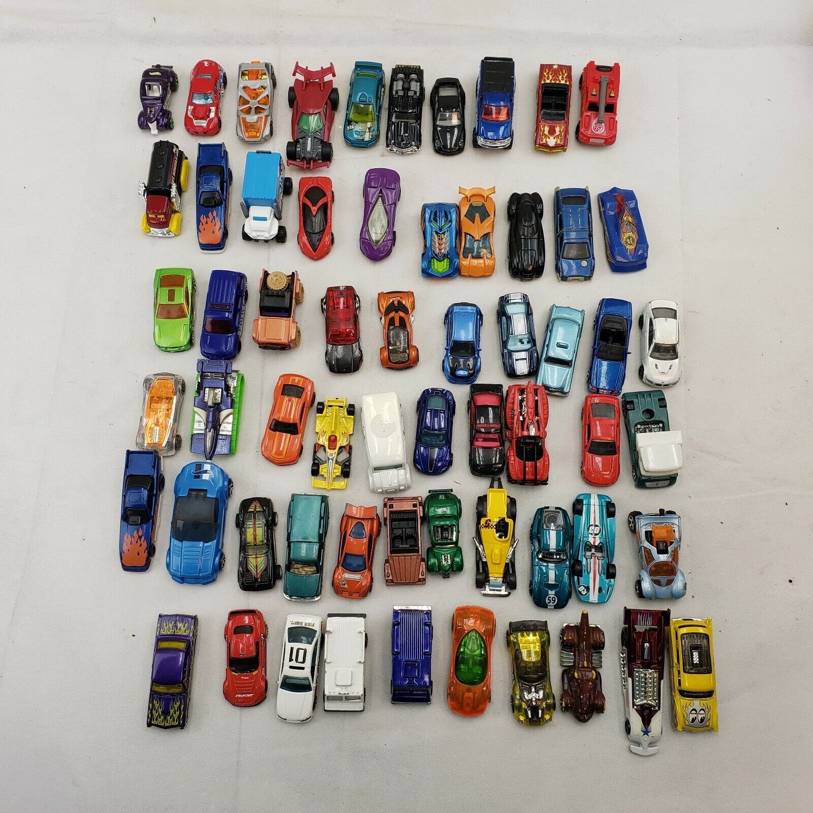 Lote de 8 carros de corrida Hot Wheels 1990-2000 em estado 1/64 muito bom a  EX