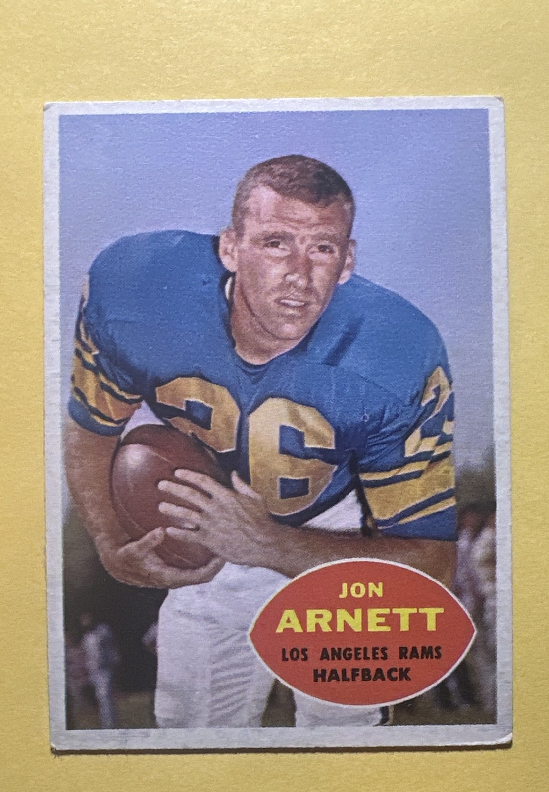 Jon Arnett #64 Football Cards 1960 Topps trading card — raw and PSA graded price guide