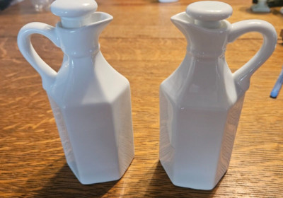 Two Vintage Xcell White Cruets with Stoppers