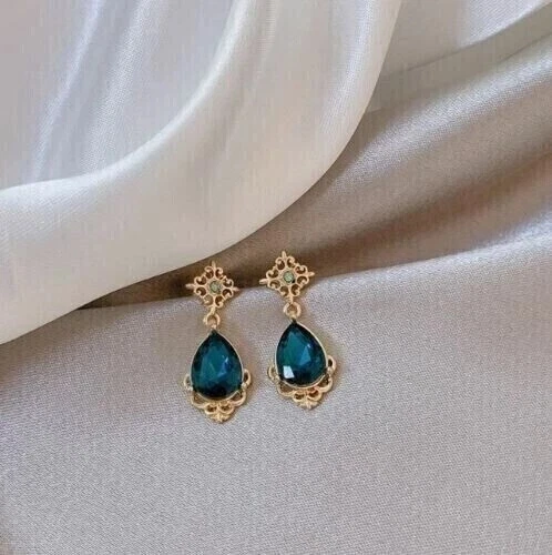 Pendiente colgante/gota de topacio azul simulado corte pera de 2 quilates enchapado en oro amarillo de 14 k Foto 3 de 4