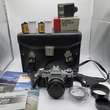Canon AE-1 35mm SLR Film Camera 50mm Lens FD with Converter Manual Mount Films