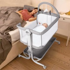 Baby Bassinet Bedside Sleeper with Storage Basket,Wheels  Hanging Toys, Easy...