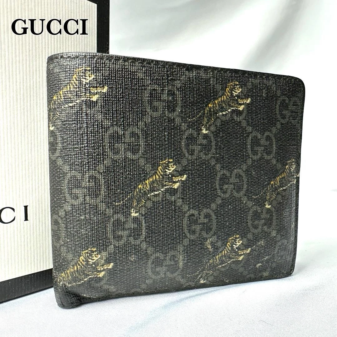 Portefeuille GUCCI cuir noir tigre GG suprême du Japon
