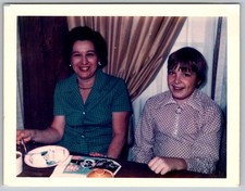 Vtg Color Snapshot Smiling Woman & Boy At Table 1973