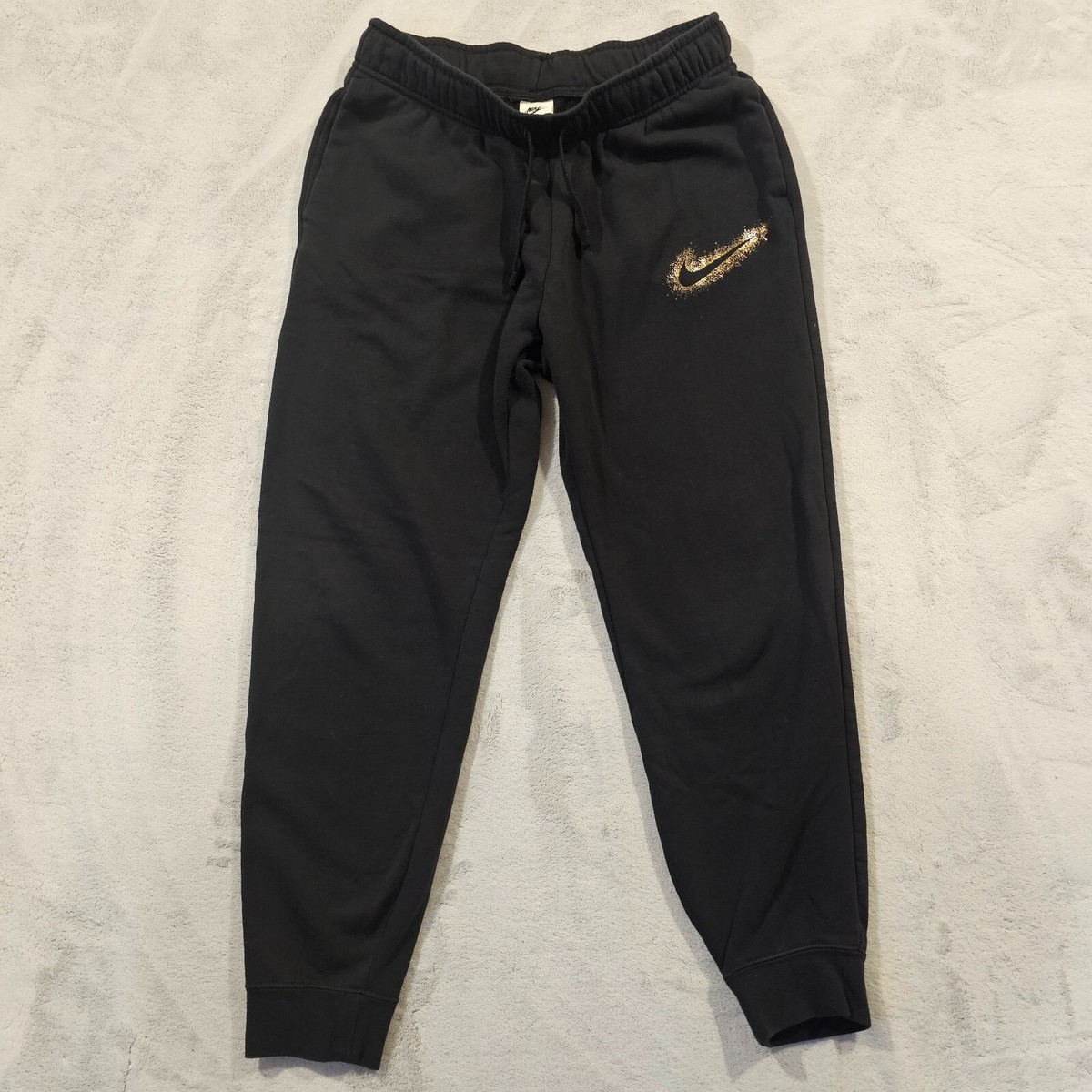 black and gold nike sweatpants