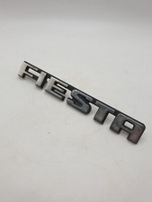 Insignia de arranque de puerta trasera genuina Ford Fiesta MK1 usada pieza OEM