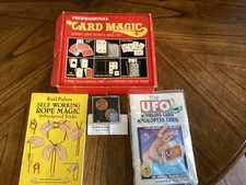 assortment of magic books and tricks